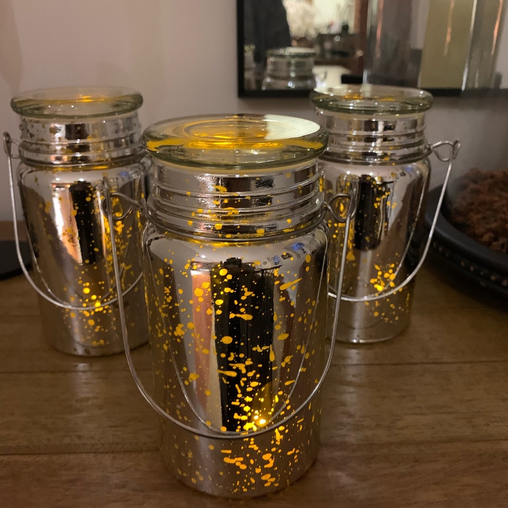 Set of 3 decorative mercury glass canning jars.  Like new!